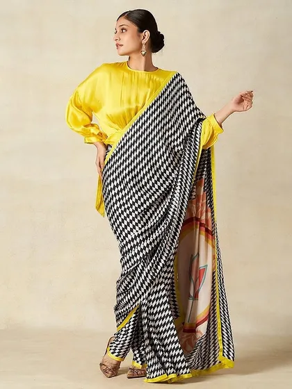 Another elegant look for the Gulabo by Abu Sandeep campaign. The makeup is subtle and polished, allowing the bold, graphic saree to be the star.