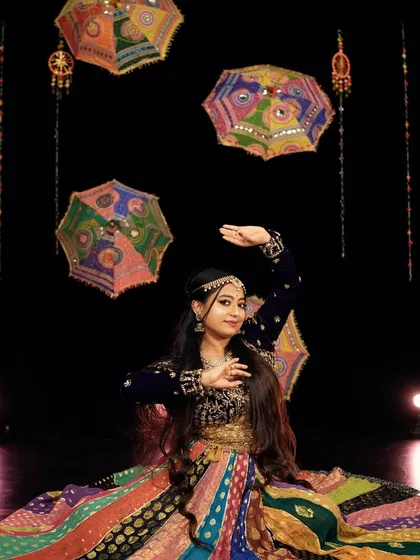 A graceful pose from my Navratri photoshoot, showcasing the traditional attire and festive decorations at the studio.