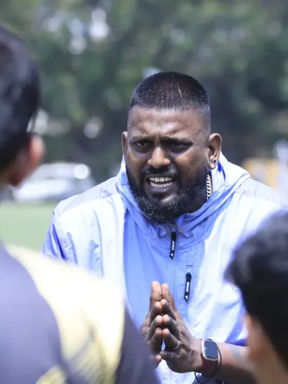 Coach Allwyn's passionate instructions during the U-15 semi-final. His guidance and energy from the sidelines are a driving force for the team.