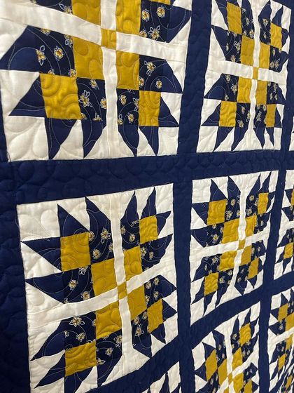 An angled view of the Bear Paw quilt.