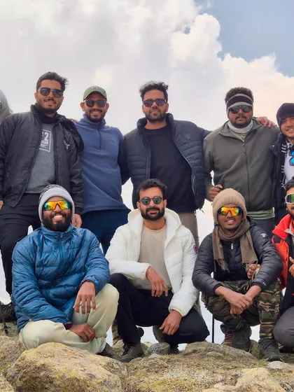 A happy group of trekkers posing for a photo on the Hampta Pass trail. Good people, good vibes.
