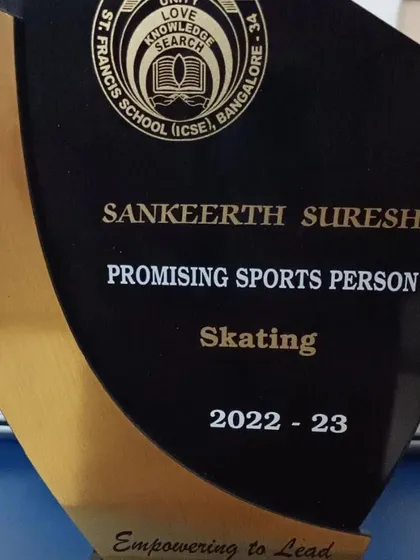 A close-up of the 'Promising Sports Person' award for Sankeerth Suresh. This recognition from his school highlights his dedication.
