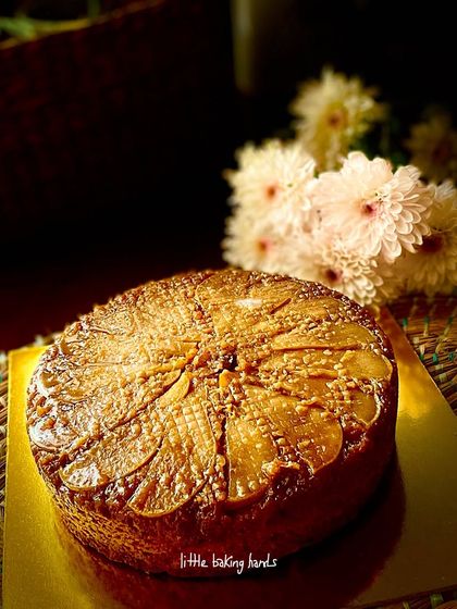 A beautiful upside-down spiced pear cake. The intricate pattern of the pears makes it a stunning centerpiece for any table.
