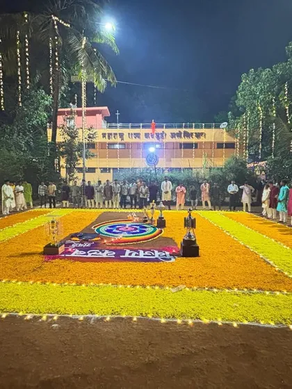The beautiful setup for our annual Laxmi Pujan, with the Maharashtra State Kabaddi Association building in the background.