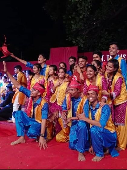 The final pose of a winning performance. This is the St. Thomas Jr College team on stage after giving their all. I work with college groups to refine their technique and teamwork for competitive events.