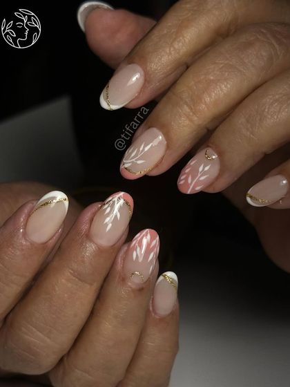 Another view of the elegant floral set, showing how the design flows across the nails.