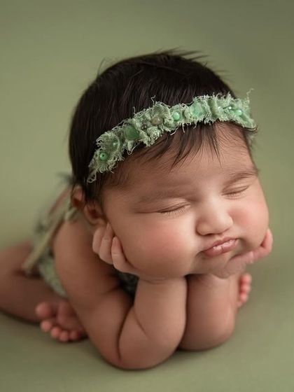 Another adorable pouty expression. Each baby has their own little personality, and I love capturing these unique moments.