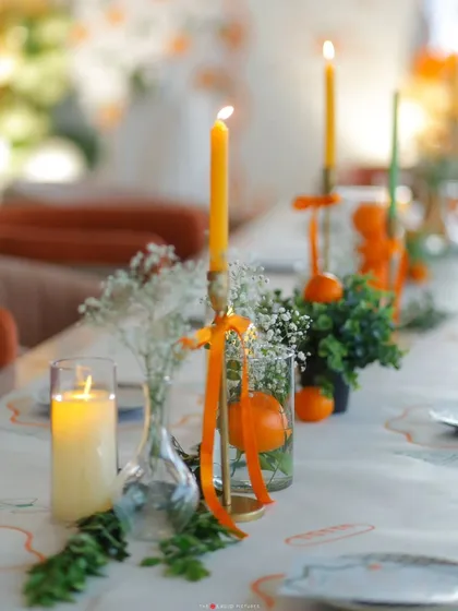 A tablescape should be an experience. For this fresh and modern baby shower, we used the vibrancy of citrus and the soft glow of candlelight to create a setting that felt both organic and incredibly chic.