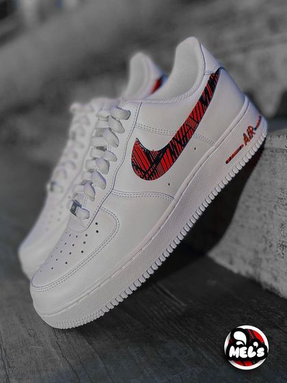 A side profile of the MotoGP custom AF1, highlighting the patterned swoosh and midsole detail.