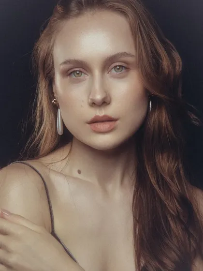 Achieving that perfect 'glass skin' is a skill I've honed over many shoots. This portrait showcases a clean, luminous makeup look where the focus is on dewy, healthy-looking skin, groomed brows, and a soft lip. It’s perfect for beauty campaigns and classic portraiture.