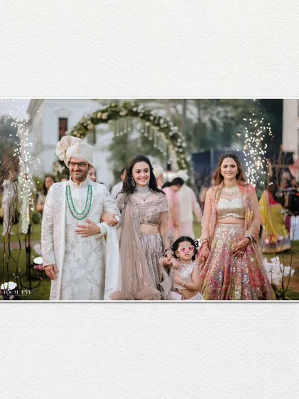 A beautiful family portrait during the groom's procession, capturing multiple generations together in a single, happy frame.