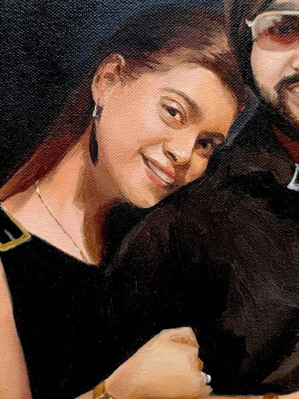 A close-up of the wife's face in this cozy portrait.