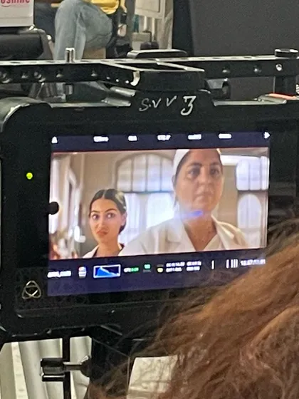 A behind the scenes look from the monitor on the set of 'Dange/Por'. It's fascinating to see how the scene is being framed and captured in real-time by the director of photography.
