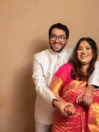 A joyful and candid moment from a pre-wedding shoot. The couple's laughter is infectious and shows their genuine happiness.