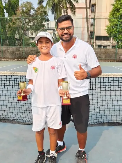 Head coach Gitesh Awasthi with Aarav Chhallani celebrating his successful tournament in Nashik.