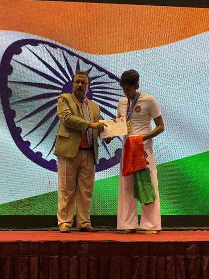 Bringing glory to the academy and the nation. Shandai Tanishq Jain receives his silver medal at the 9th Asian Goju-Ryu Tournament in Colombo for his performance in the Seniors male -75 kg category.