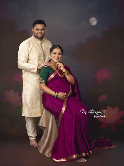 A formal couple's portrait that is both elegant and warm, perfect for a family album.