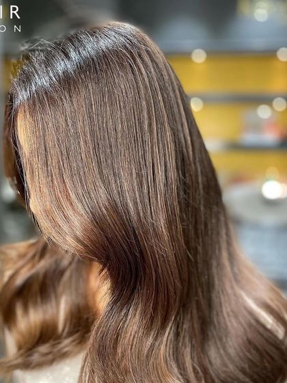 A close-up on the beautiful, hand-painted highlights. This shows the detail and artistry that goes into every balayage I create.