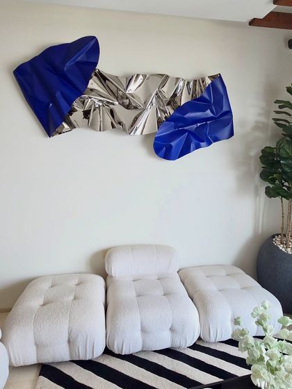 Another perspective of the client's living space, showing how the wall sculpture commands attention.