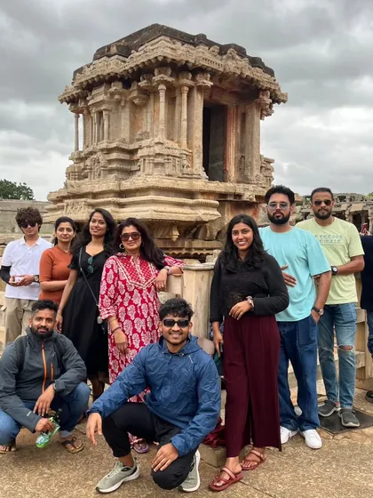 Our group in front of the Stone Chariot in Hampi, a must-have photo for every visitor.