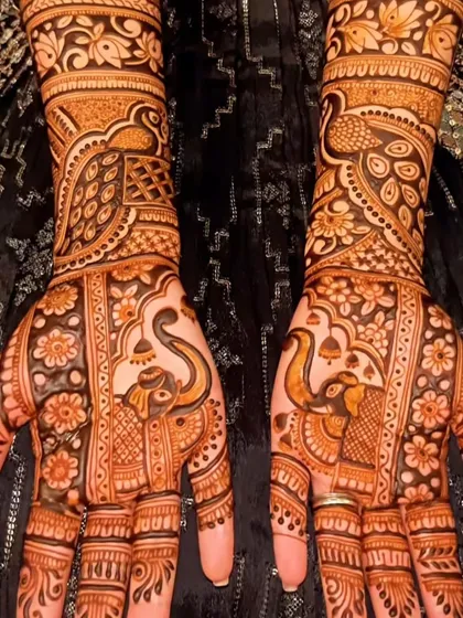 A beautiful combination of peacock and elephant motifs, perfect for a traditional bridal look. The floral patterns add a soft, feminine touch.