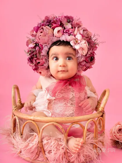 Sitter sessions, around 6 to 9 months, are my absolute favorite. This is when your baby's personality truly begins to shine. Look at that curious, wide eyed expression. I focus on capturing these emerging traits, from playful giggles to thoughtful gazes.