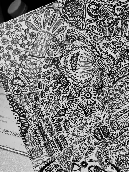 A macro shot of the fine details. You can see the texture of the paper and the crispness of the ink.