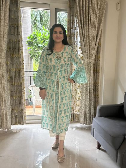 Another angle of my Teej look. The A-line kurta with the front slit and bell sleeves is a modern take on ethnic wear, making it stylish yet comfortable for celebrating festivals.