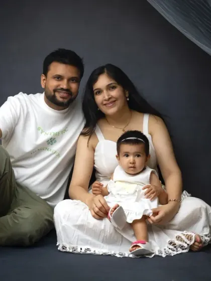 A relaxed, seated family portrait. This comfortable posing allows for natural smiles and a genuine sense of connection.