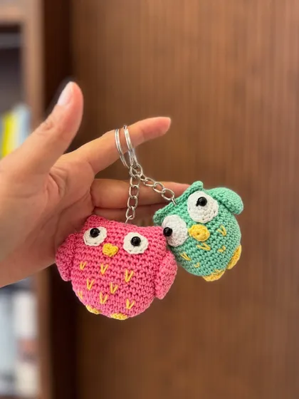 Whooo's the cutest? These little owl keychains are. Available in different colors, they add a touch of wisdom and whimsy to your keys or bag.