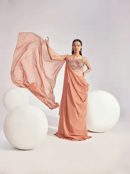 The Mira Saree Set in motion, with the lightweight drape flowing gracefully, creating a stunning visual impact.