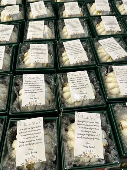 The final presentation of the braided candles, packed in our new hard boxes with custom 'Thank You' notes for a special event. This shows the full gifting experience.