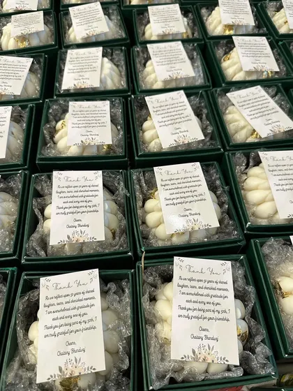 A bulk order of my braided candles with gold leafing, packed in elegant hard boxes for a 50th birthday party.