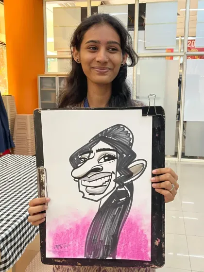 A simple yet expressive caricature for an employee at Dentus India. It's a great way to make everyone feel special.