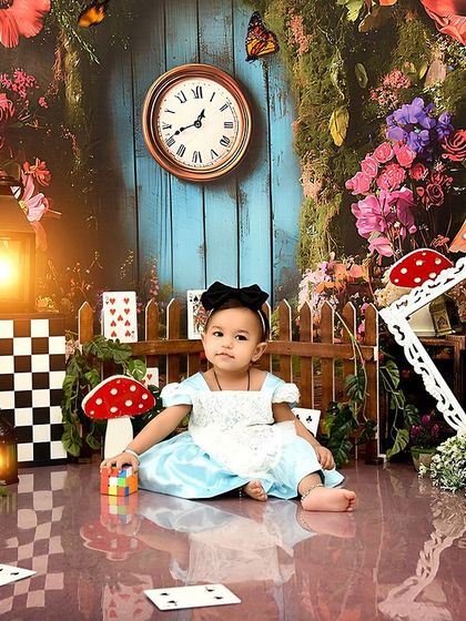 Welcome to Wonderland! This "Alice in Wonderland" theme is filled with magical details like talking flowers, playing cards, and whimsical mushrooms.