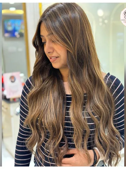 Level up your look with ash brown. The cool, muted tones bring a modern twist to classic brunette.