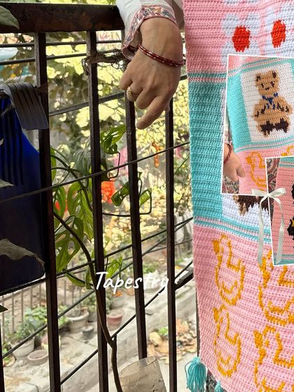 A close-up of the teddy bear and duck panels on our custom tapestry muffler, highlighting the intricate stitch work.