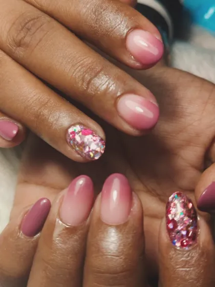 Another angle of the pink ombre and glitter set, showing how the light catches the iridescent glitter pieces.