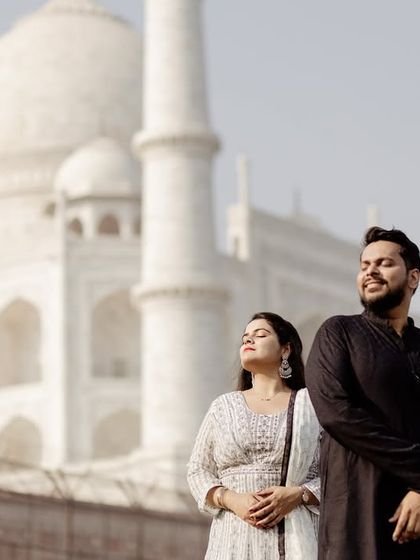 A sun-kissed candid moment, showing the couple enjoying the warmth and beauty of the location. Natural light is key to creating these warm, genuine portraits.