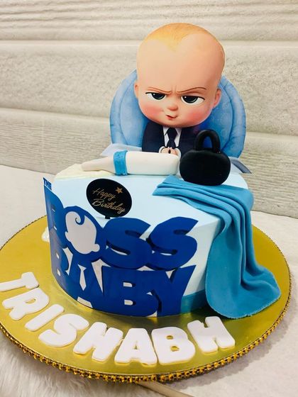 A Boss Baby cake that means business. This design features the iconic character in his chair, complete with a baby bottle and a serious expression.