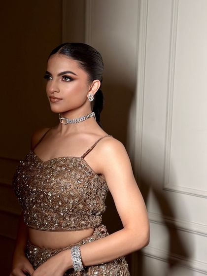 Another shot of this edgy and glamorous look. The focus is on the eyes, with a clean, sculpted base.