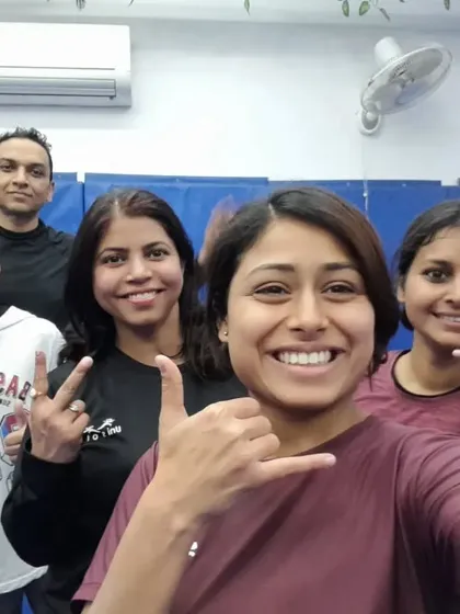 Our doors are open to everyone, regardless of age, size, or background. This picture captures the welcoming and inclusive spirit of our classes. Here, you'll find a supportive environment where you can build confidence and skills at your own pace.