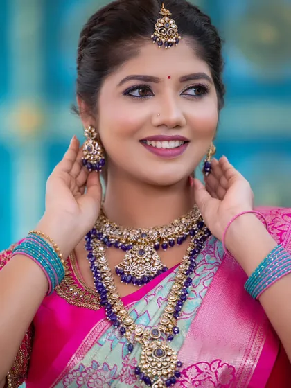 This is another example of my Jadau work, this time with beautiful blue beads. It’s a complete set with a choker, a longer necklace, and matching earrings that can brighten up any silk saree.