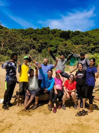 This is what it's all about. The smiles, the friendships, and the shared joy of discovery. This happy group on a Gokarna beach trek captures the spirit of our community.