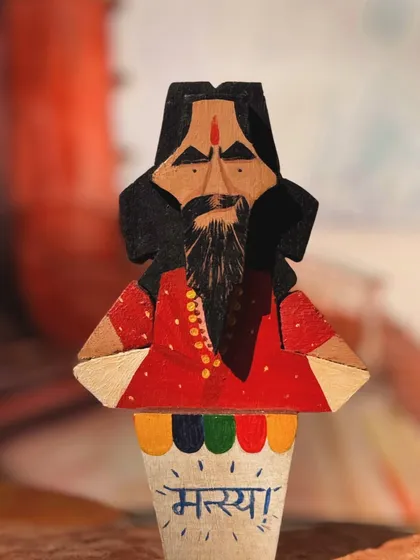 The enigmatic Machhli Baba, a key character in the film's plot. I focused on the details of his costume and his intense gaze to make this wooden figurine a standout piece in the collection.