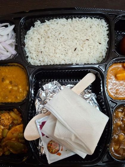 Another example of my packed lunch thali, showcasing a different combination of sabzis and dal.