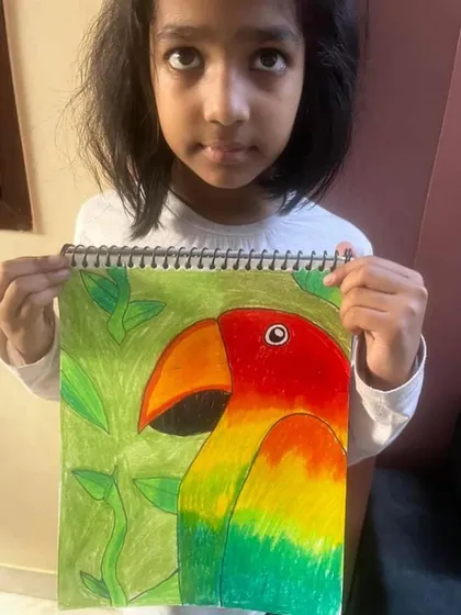 A stunningly colorful parrot drawn by one of my students. This piece shows a great understanding of color blending and composition.