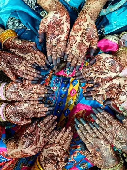 There's no such thing as too much mehndi! This is what a real mehndi party looks like, with everyone showing off their beautiful henna. I love being part of these happy moments and making sure every guest feels included.