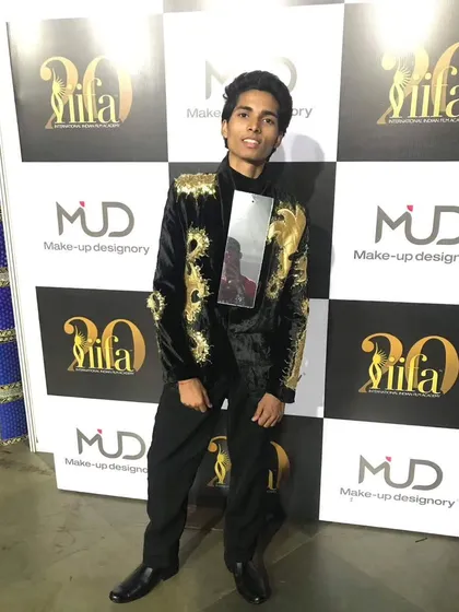 A solo shot from the IIFA Awards red carpet. I bring my experience from the professional stage to your family's sangeet.