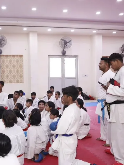 Students listening intently during the seminar. The path to becoming a champion involves being a dedicated student.